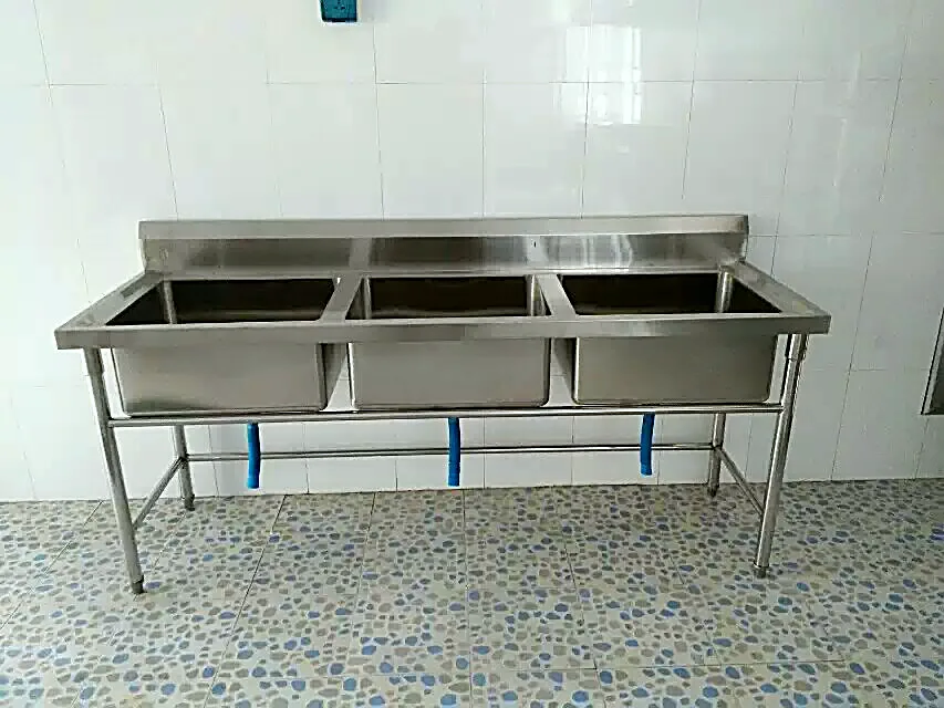 Triple bowl stainless steel sink front view