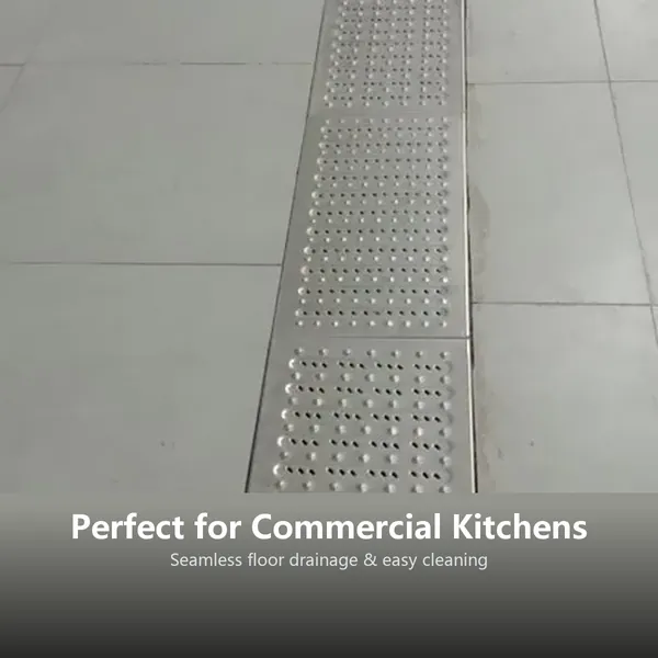 Trench drain grate in tiled kitchen floor