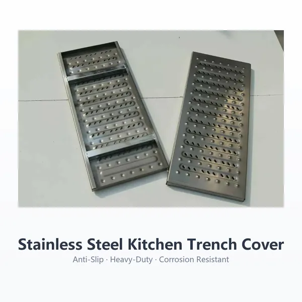 Two stainless steel trench covers on white background