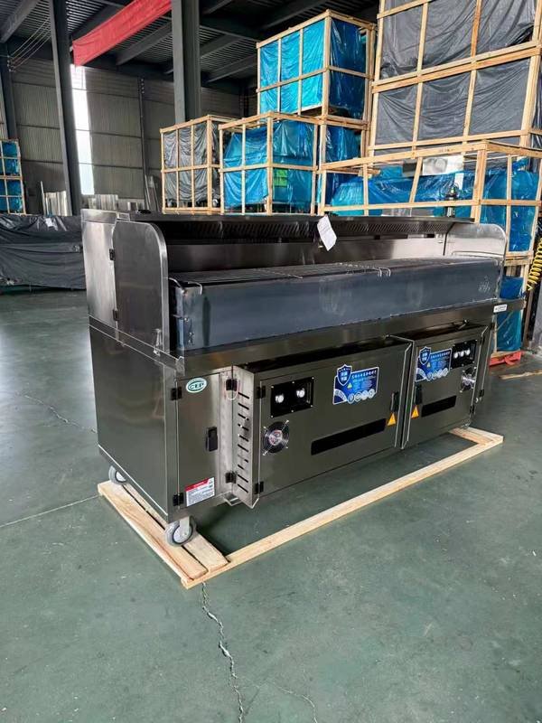 Finished BBQ cart with charcoal grille installed on wooden crate - factory inspection before shipment